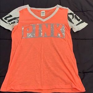 PINK orange tee with logo